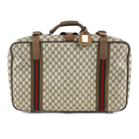 gucci suitcases sale.